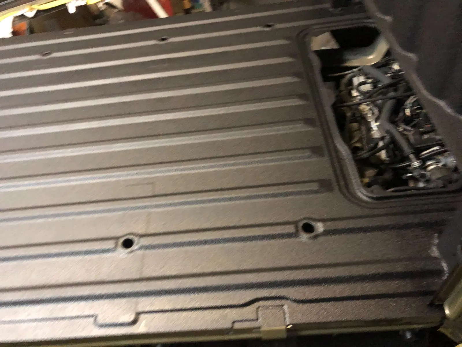 RAPTOR-coated Hijet Jumbo bed floor ribs and access opening
