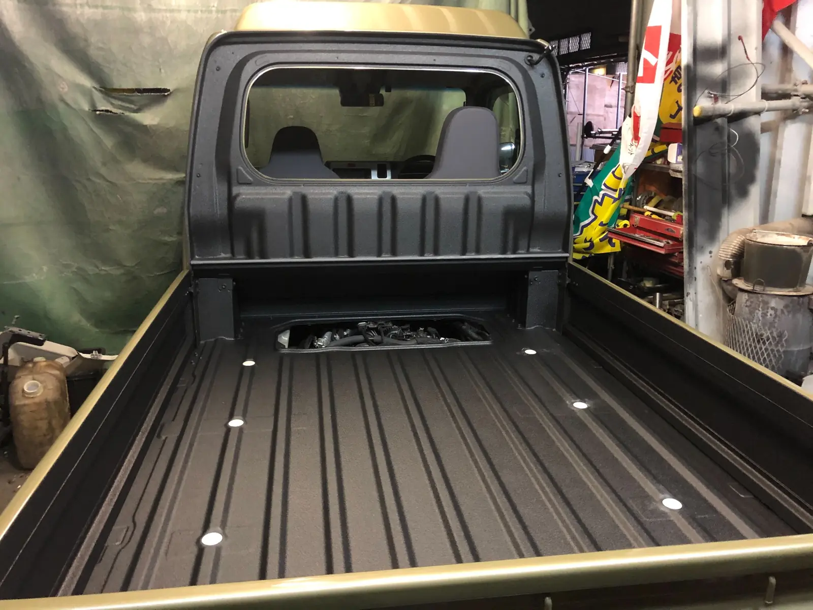 Hijet Jumbo cargo bed and rear cab panel with black RAPTOR coating